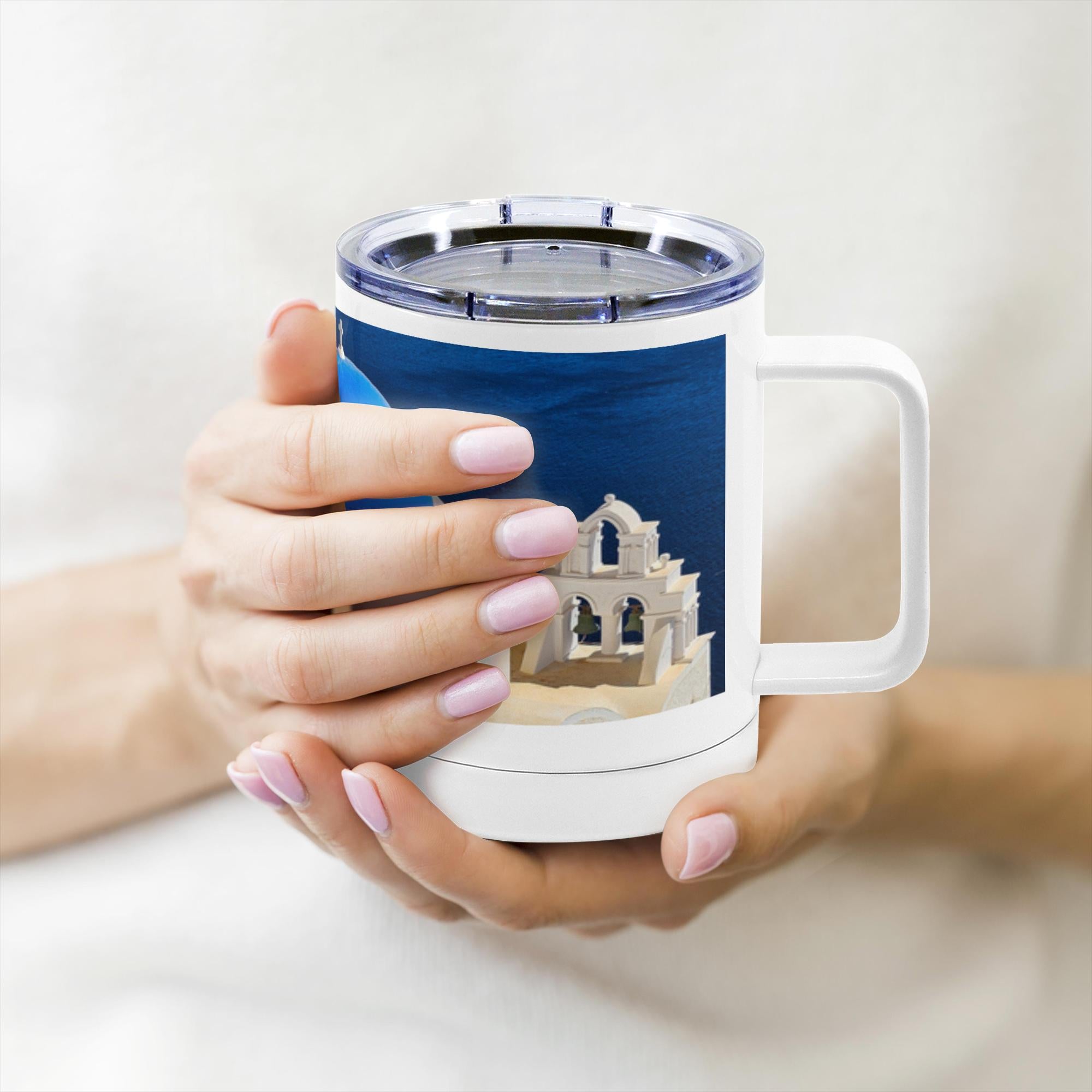 Santorini Blue Domes travel mug by Sam Gilliss Visual Arts, 10oz insulated stainless steel mug with handle and scenic blue dome design.