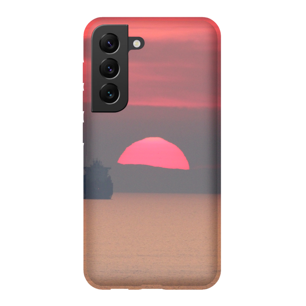 Premium cell phone case featuring Sam Gilliss Visual Arts' "Ship at Sunset, Corsica" with a scenic Mediterranean coast design.