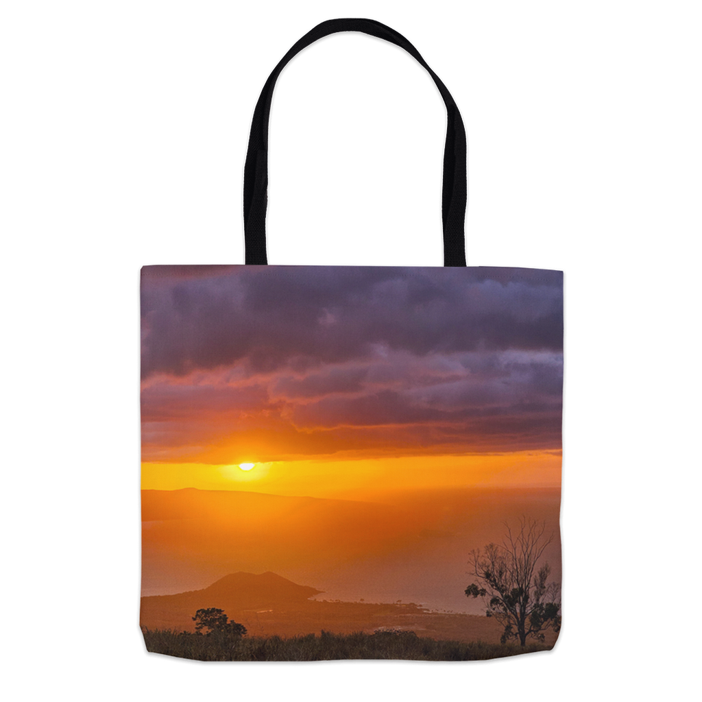 Hawaiian sunset over the ocean tote bag by Sam Gilliss Visual Arts, featuring vibrant tropical sunset and ocean scene.