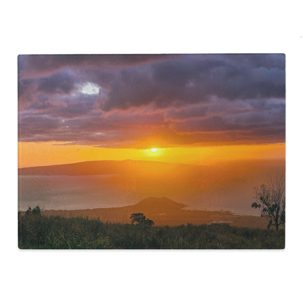 Sam Gilliss Visual Arts Keokea Sunset tempered glass cutting board and elegant placemat featuring ocean sunset artwork.