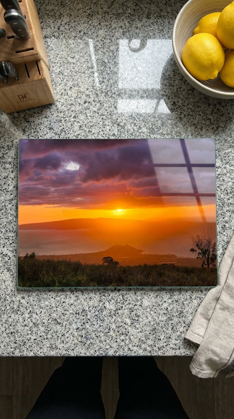 Sam Gilliss Visual Arts Keokea Sunset over the Ocean tempered glass cutting board and elegant placemat set with vibrant sunset design