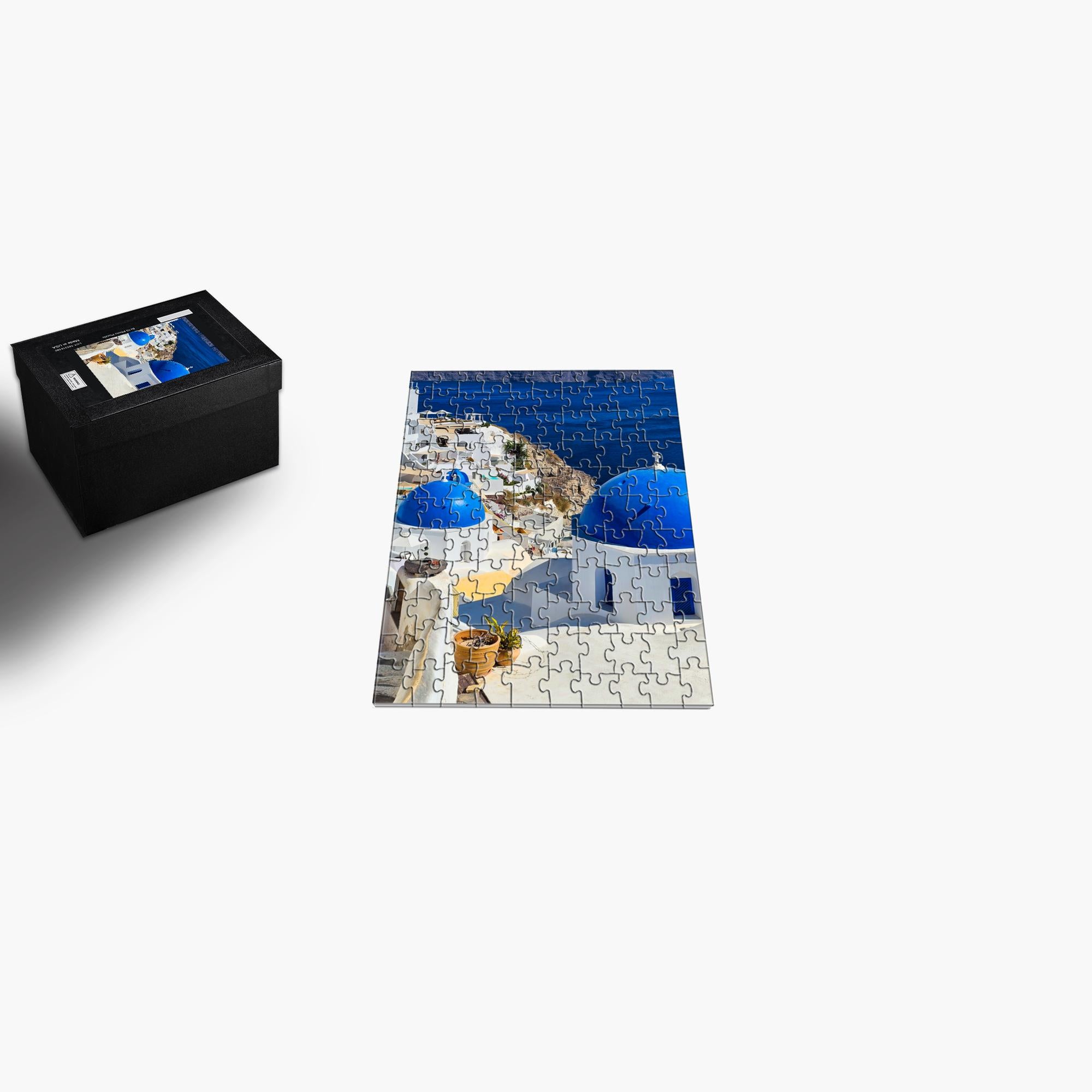 Sam Gilliss Visual Arts puzzle featuring Santorini blue domes in Oia Greece, 1000-piece fine art jigsaw puzzle image.