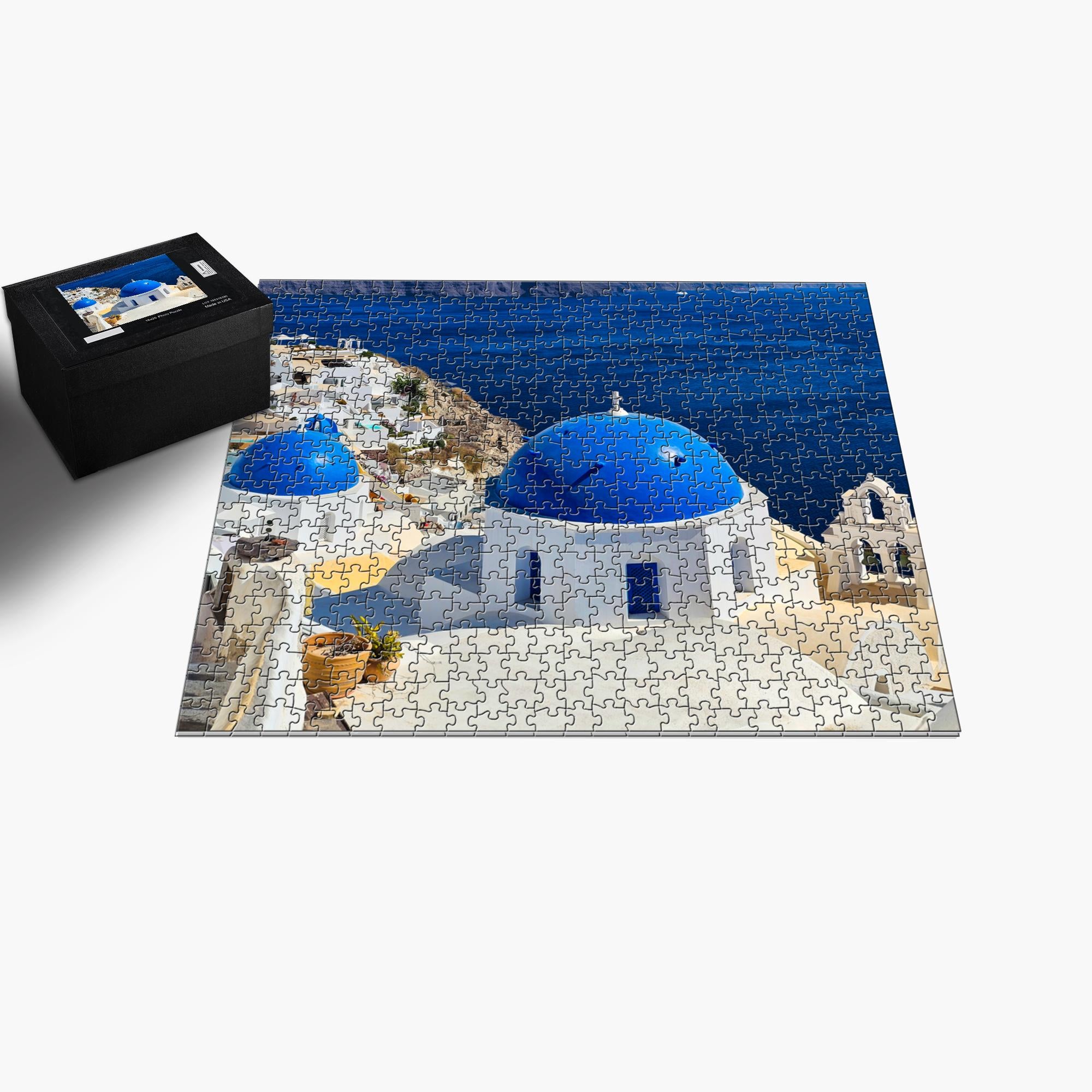 Sam Gilliss Visual Arts Santorini Blue Domes puzzle featuring Oia Greece with colorful, detailed 110 to 1000-piece jigsaw puzzle artwork.