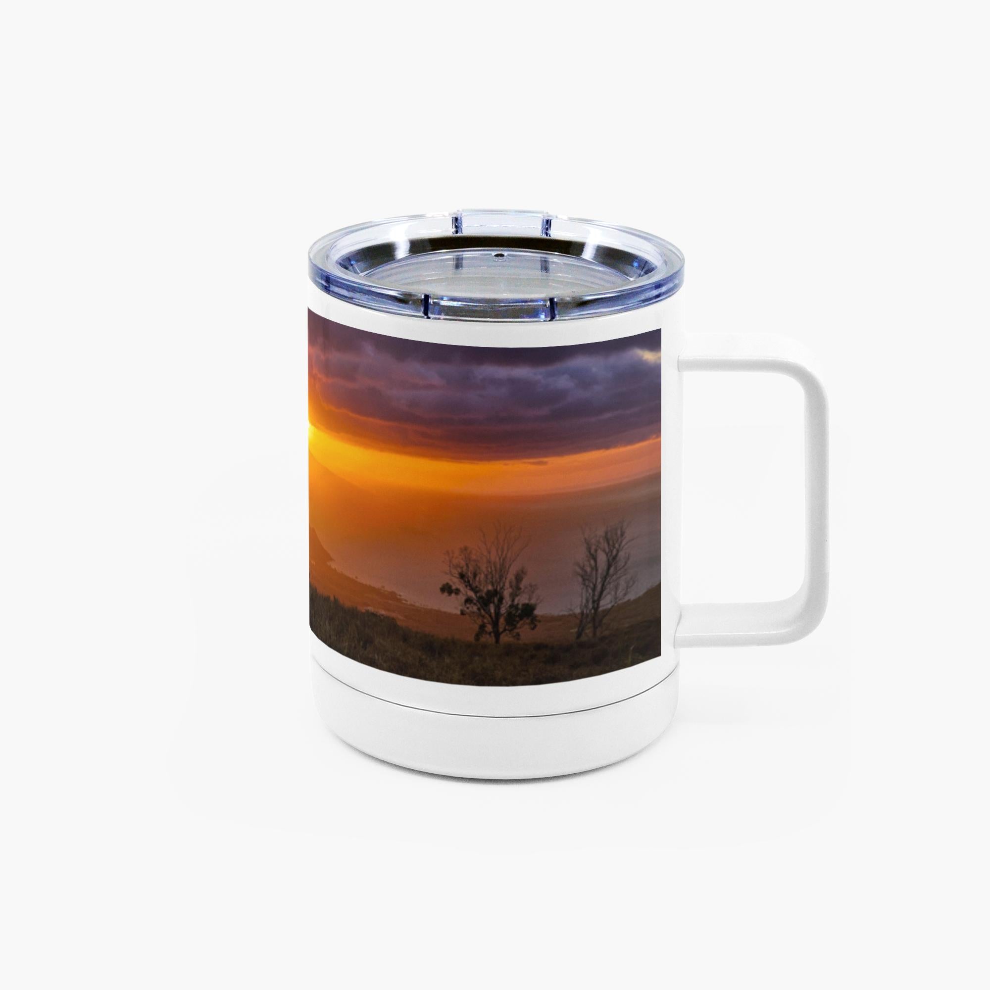 Sam Gilliss Visual Arts Keokea Sunset ocean scene on a 10oz stainless steel insulated mug with a black handle and lid.