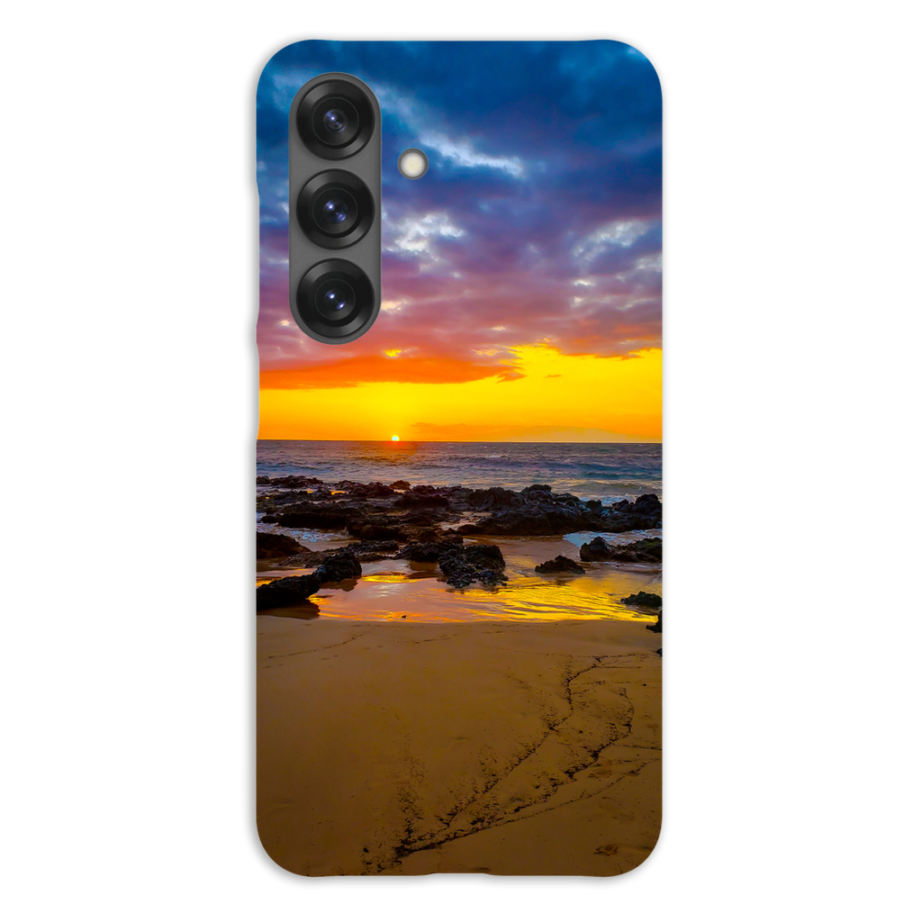 Sam Gilliss Visual Arts Maui Sunset phone case featuring a vibrant Hawaiian island sunset with golden hues on a sleek protective design.