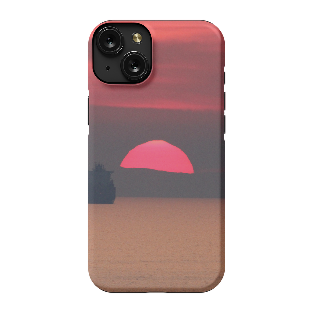 Premium cell phone case featuring Sam Gilliss Visual Arts' "Ship at Sunset, Corsica" artwork with Mediterranean coast scene.