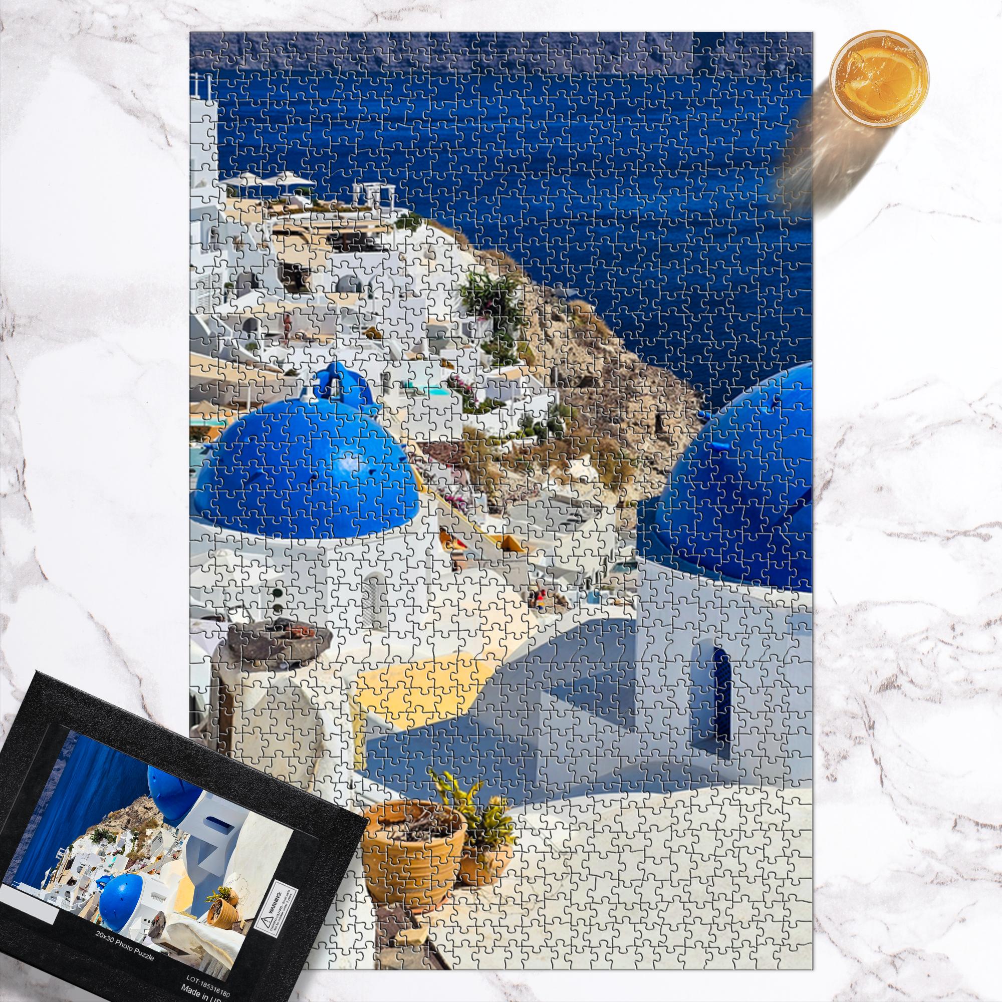 Sam Gilliss Visual Arts Santorini Blue Domes puzzle featuring Oia Greece with 110 to 1000 pieces, showcasing iconic blue domed buildings.