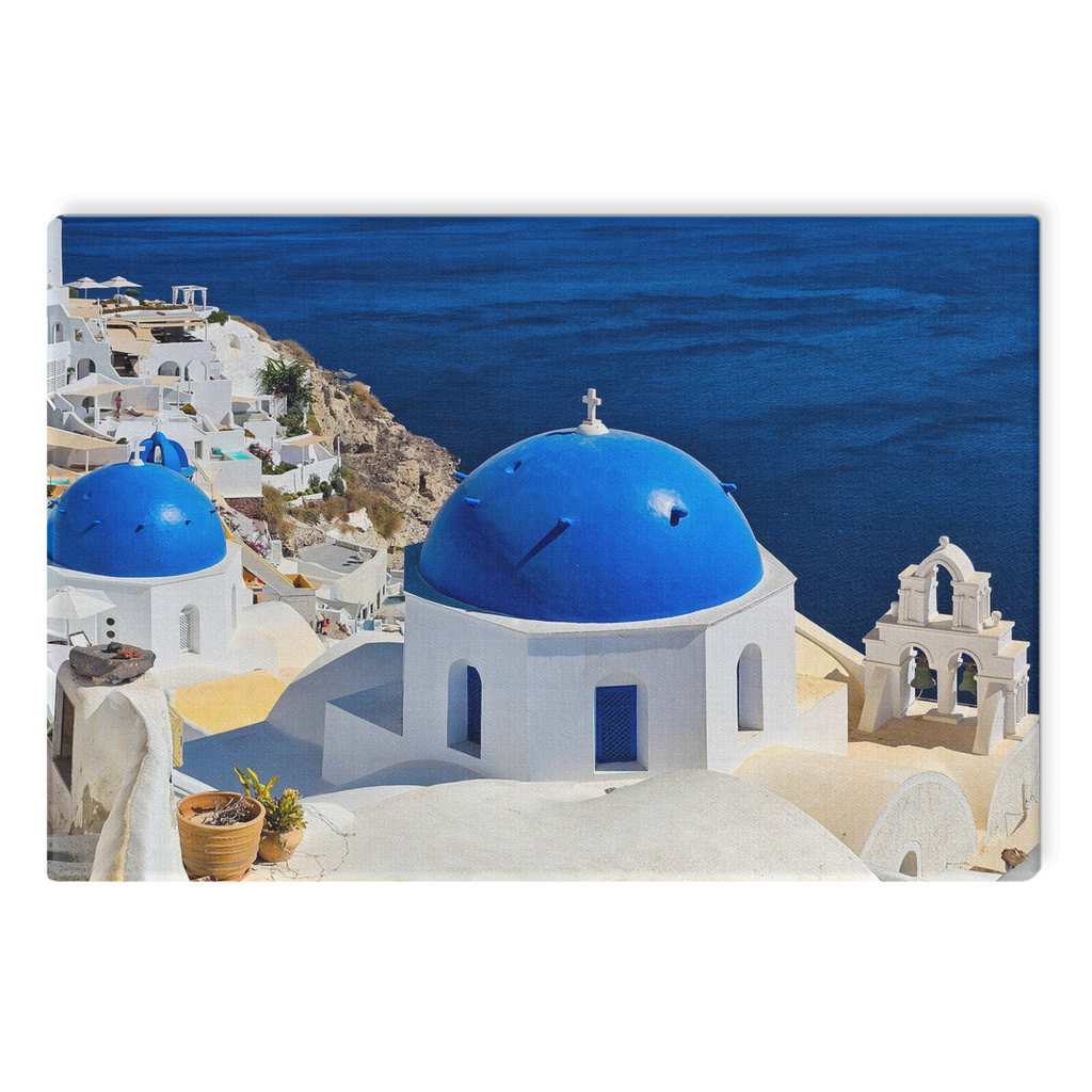 Santorini Blue Domes canvas wall art by Sam Gilliss, showcasing Oia’s iconic blue-domed churches and Mediterranean coastal scenery.