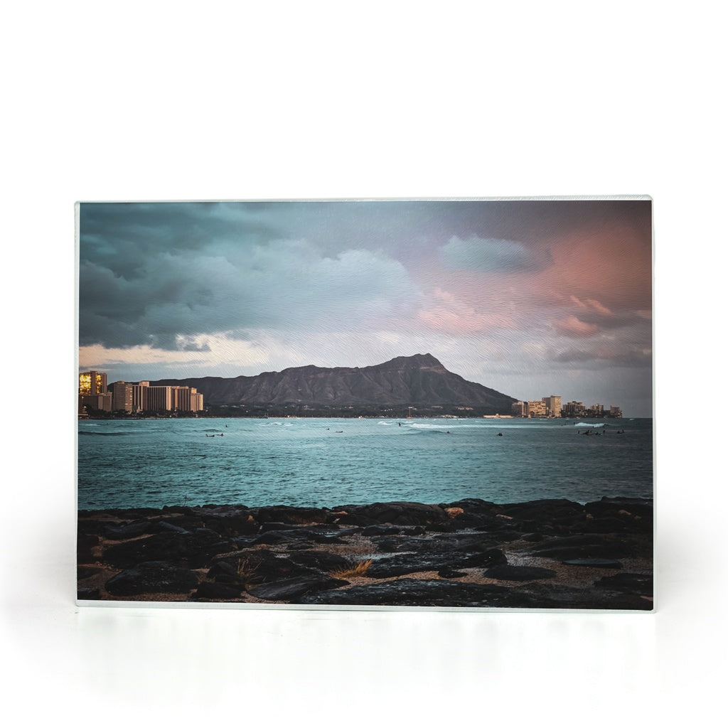 Tempered glass cutting board and placemat featuring the Diamond Head, Honolulu design by Sam Gilliss Visual Arts.