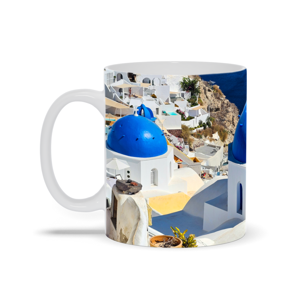 Blue Domes of Oia Santorini ceramic coffee mug featuring iconic blue domes and white architecture, 11 oz. travel-inspired design.