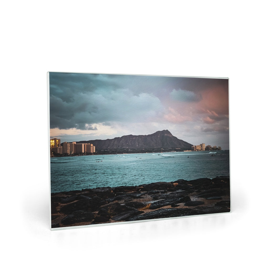 Tempered glass cutting board and elegant placemat featuring Diamond Head, Honolulu design by Sam Gilliss Visual Arts.