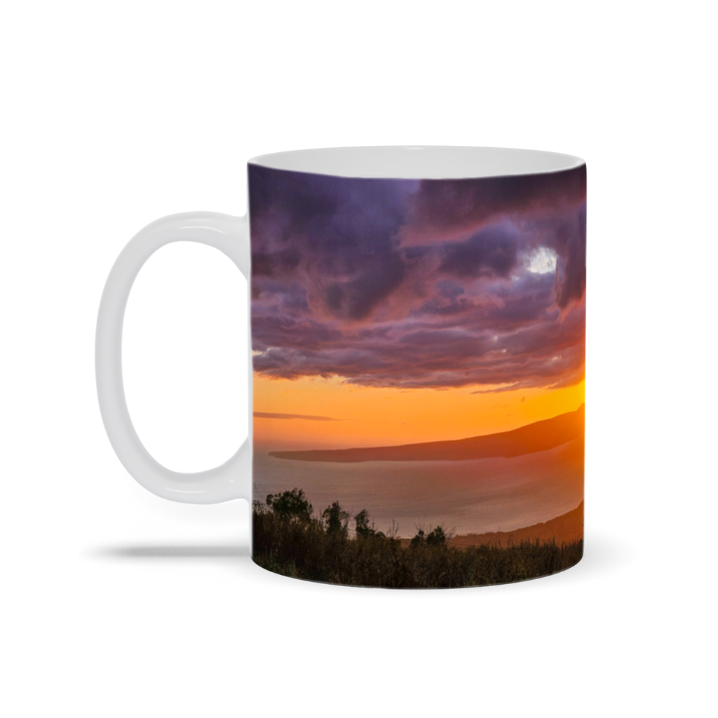 Sam Gilliss Visual Arts Keokea Maui Sunset 11oz ceramic coffee mug with Highland Ocean View design, featuring vibrant sunset and ocean scene.