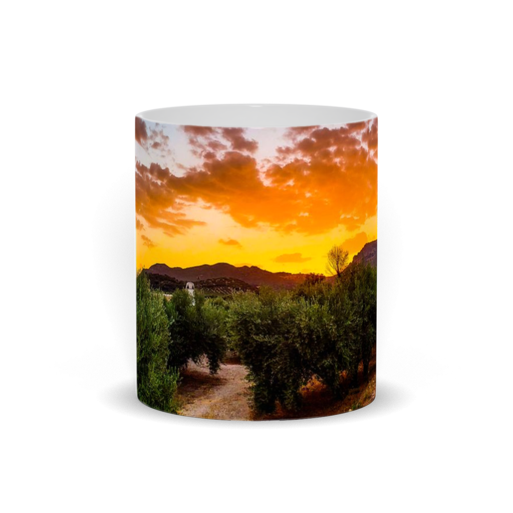 11oz ceramic coffee mug featuring Sam Gilliss' "Sunset Over the Olive Groves" landscape in Central Spain countryside.